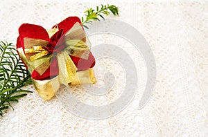 Christmas gift decoration on old lace