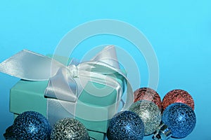 Christmas gift and decorations over blue background. Holidays, Christmas toys concept.