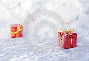 Christmas gift on defocused lights background