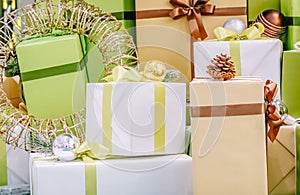 Christmas gift giving concept ,green and white and brown gift box with a ribbon and a bow