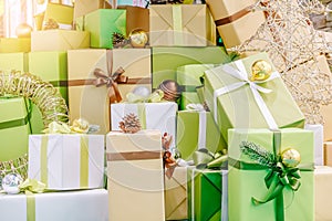 Christmas gift giving concept ,green and white and brown gift box with a ribbon and a bow