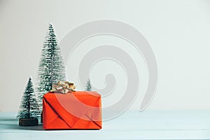 Christmas gift and pine tree. Merry Christmas and happy new year concept