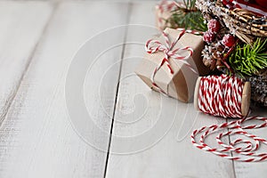 Christmas gift or present box wrapped in kraft paper