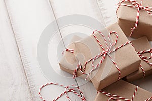 Christmas gift or present boxes wrapped in kraft paper