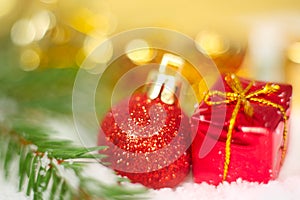 Christmas gift on snow macro