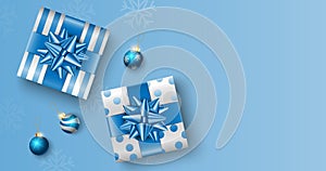 Christmas gifts on blue box background with copy space for text, Christmas poster, greeting card