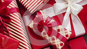 Christmas gifts, boxing day and traditional holiday presents, classic red and pink xmas gift boxes, wrapped luxury