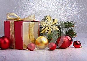 Christmas gifts. Christmas decoration with presents and red ball with fir branches