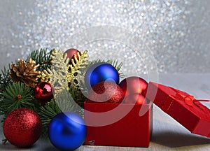 Christmas gifts. Christmas decoration with presents and red ball with fir branches