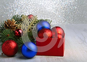 Christmas gifts. Christmas decoration with presents and red ball with fir branches
