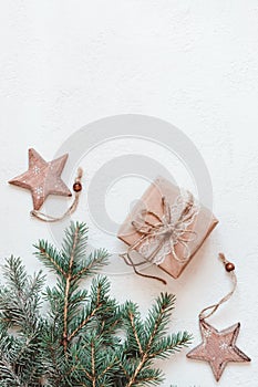 Christmas gifts decorated with natural paper and wooden star baubles. Zero Waste Christmas