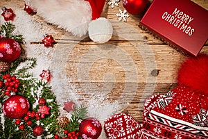 Christmas gifts decoration on antique rustic wooden background; above view looking down with wood , top view with wood copy space