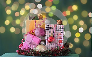 Christmas gifts,decoration and balls with bokeh christmas lights background