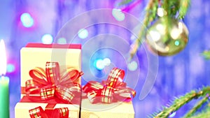 Christmas gifts are focussed and blurred on blue backgrounds