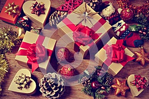 Christmas gifts and ornaments on a rustic wooden table