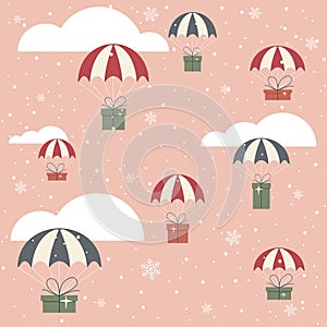 Christmas Gifts with Parachute on Pink Background