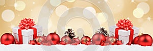 Christmas gifts presents balls banner decoration golden background copyspace photo