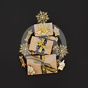 Christmas gifts, presents, ornaments on black holiday background. Merry Christmas luxury stylish greeting card, invitation, flyer