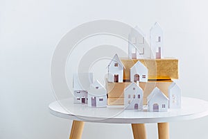 Christmas gifts with snowflakes. Small white houses