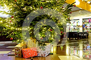 Christmas gifts under the tree. Shallow depth of field, toning