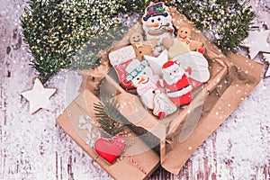 Christmas gingerbread in a box and holiday gift with heart