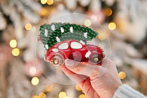 christmas gingerbread car with christmas tree on the bokeh