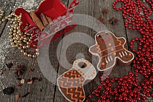 Christmas gingerbread cinnamon, Christmas decorations, tea, beads, Santas sleigh.