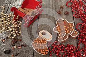 Christmas gingerbread cinnamon, Christmas decorations, tea, beads, Santas sleigh.