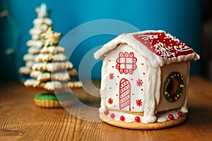 Christmas gingerbread cookie house. Holiday sweets. Holidays food and decoration concept