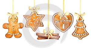 Christmas gingerbread cookies and cinnamon sticks hanging border on a white background.