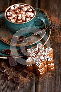 Christmas gingerbread cookies with hot chocolate and marshmallows