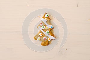 Christmas gingerbread cookies on old wooden background. Merry Christmas and Happy New Year. Xmas baking concept. Top