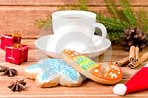 Christmas gingerbread and hot coffee in a white Cup. The Concept Of Christmas , food decor