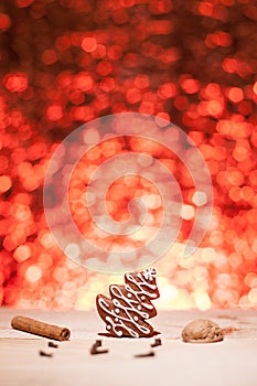 Christmas gingerbread with red blurred background