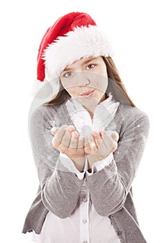 Christmas girl blowing snow dust over white
