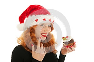 Christmas girl eating cake