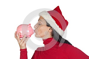 Christmas Girl giving a kiss piggy-bank