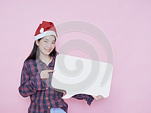 Christmas girl holding blank poster