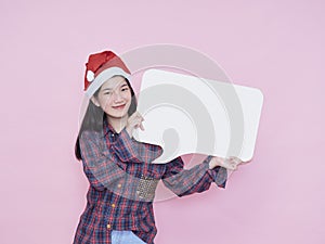 Christmas girl holding blank poster