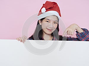 Christmas girl holding blank poster