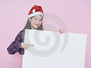 Christmas girl holding blank poster