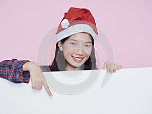 Christmas girl holding blank poster