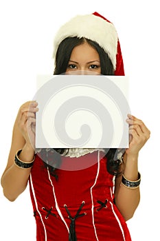Christmas girl holding up a white sign
