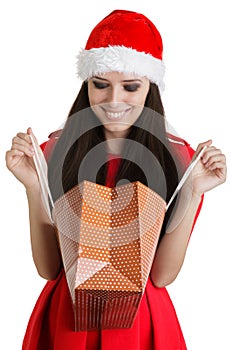 Christmas Girl Looking in Shopping Bag
