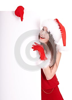 Christmas girl in santa hat with banner.