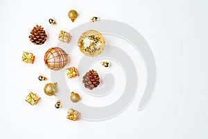 christmas golden background, christmas decoration, cones, balls, glitter, flat lay