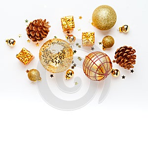 christmas golden background, christmas decoration, cones, balls, glitter, flat lay