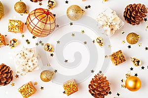 christmas golden background, christmas decoration, cones, balls, glitter, flat lay