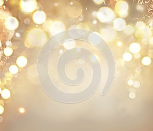 Christmas golden background. Holiday abstract glowing background