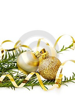 Christmas golden baubles and pine tree
